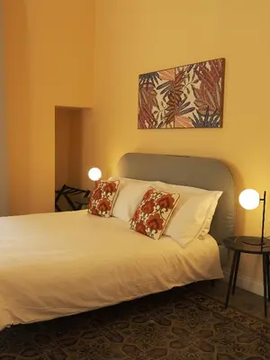 Letto o letti in una camera di Cifilì House of Charme