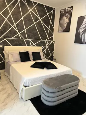 Letto o letti in una camera di Eleutheria