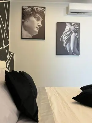 Letto o letti in una camera di Eleutheria