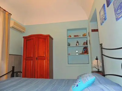 Letto o letti in una camera di B&B I Mastrazzi Riposto Giarre