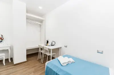 Letto o letti in una camera di DM House & Suite