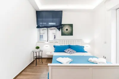 Letto o letti in una camera di DM House & Suite