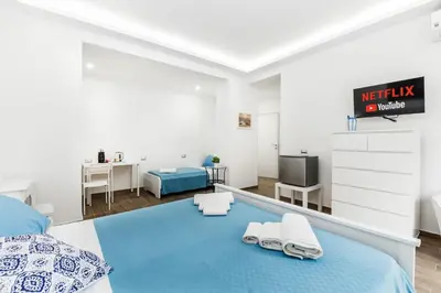 Letto o letti in una camera di DM House & Suite