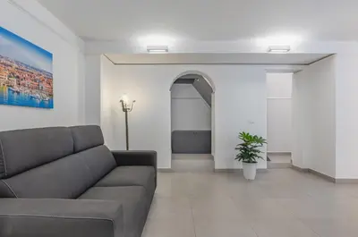 Area soggiorno di GuestHost - Parco Falcone Borsellino Modern Flat