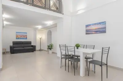 Area soggiorno di GuestHost - Parco Falcone Borsellino Modern Flat