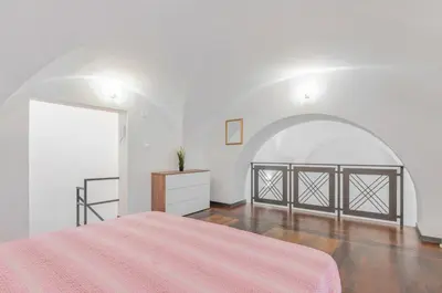 Letto o letti in una camera di GuestHost - Parco Falcone Borsellino Modern Flat