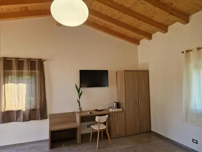 TV o dispositivi per l'intrattenimento presso Agriturismo Lumia Resort