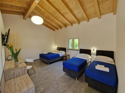 Letto o letti in una camera di Agriturismo Lumia Resort