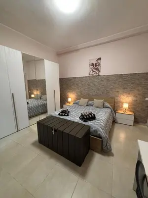 Letto o letti in una camera di Pancho House Catania