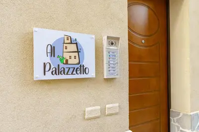 Certificato, attestato, insegna o altro documento esposto da Al Palazzetto - Lavica