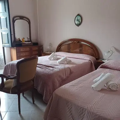 Letto o letti in una camera di Casa vacanza 'A casa dei Nonni 1'
