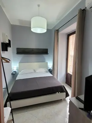 Letto o letti in una camera di Caronda Etnea House