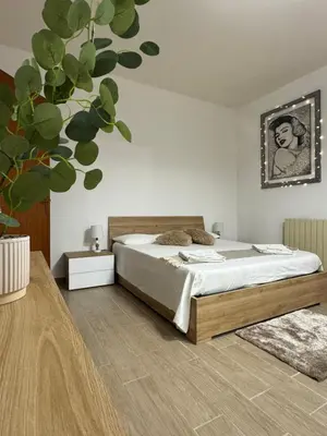 Letto o letti in una camera di Casa Sole Sofiè