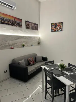 Area soggiorno di Antico Corso House