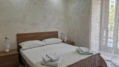 Letto o letti in una camera di Adriano's Rooms