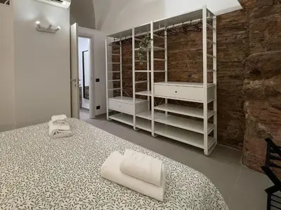 Letto o letti in una camera di Your Apartment Sicily