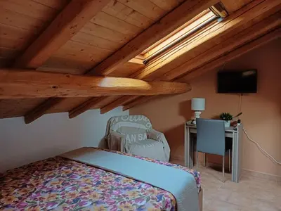 Letto o letti in una camera di Cocò House, mansarda vista mare