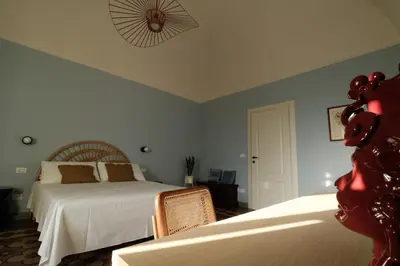 Letto o letti in una camera di Marikè Home