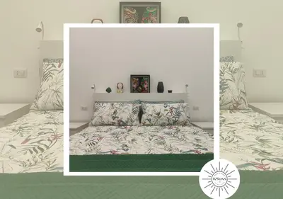 Letto o letti in una camera di KSuns Home