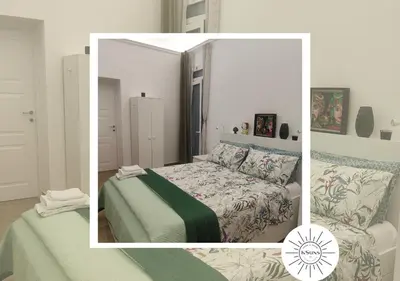 Letto o letti in una camera di KSuns Home