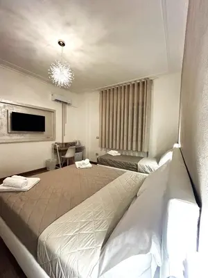 Letto o letti in una camera di EFFE Home