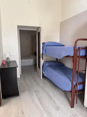 Letto o letti in una camera di Jonia Apartments