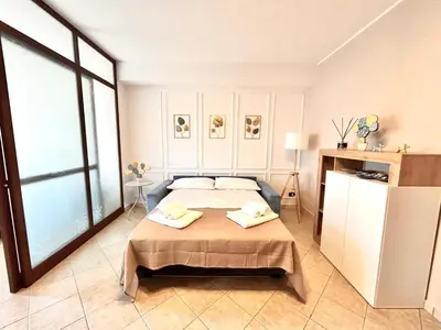 Letto o letti in una camera di MELA your home between Sea and Etna