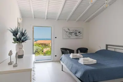 Letto o letti in una camera di Casa Klara, house in Santa Tecla