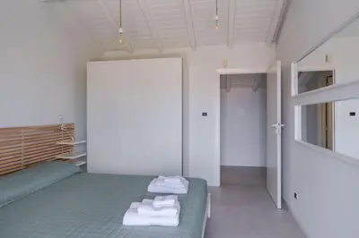 Letto o letti in una camera di Casa Klara, house in Santa Tecla