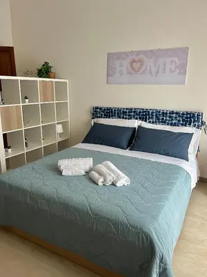 Letto o letti in una camera di Scalinata del Nespolo Acitrezza