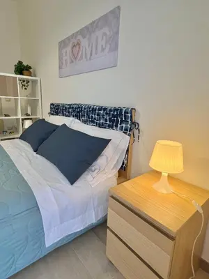Letto o letti in una camera di Scalinata del Nespolo Acitrezza