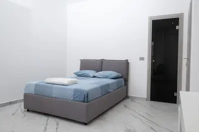 Letto o letti in una camera di Adelina House