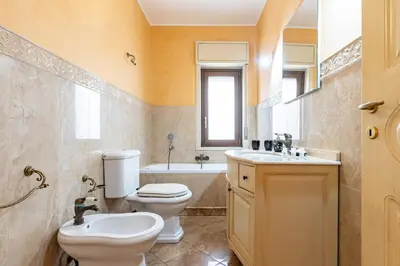 Bagno di GuestHost - Apartment with Terrace in Aci Catena