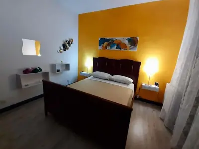 Letto o letti in una camera di LAPILLI Holidays