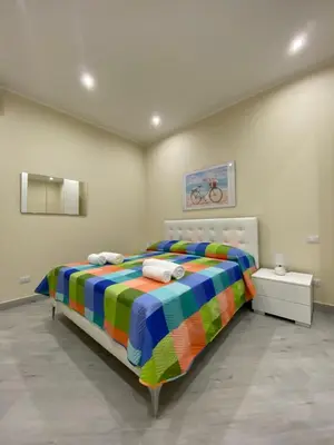 Letto o letti in una camera di Le Case del Cavaliere