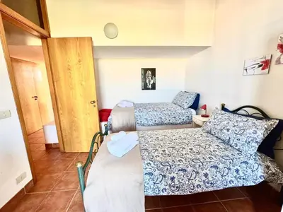 Letto o letti in una camera di Marilù e il Mare - Your home by the sea