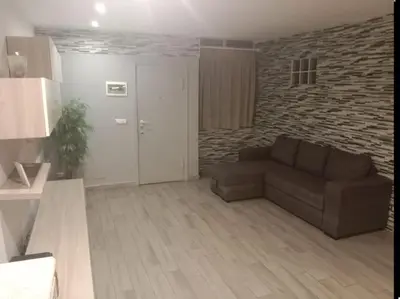 Area soggiorno di Nancy Home Catania