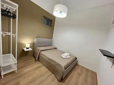 Letto o letti in una camera di Casa vacanze I Mori - Elegante,centrale,spaziosa