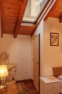 Letto o letti in una camera di La campagna e il mare
