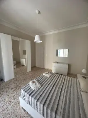 Letto o letti in una camera di Gorizia Home