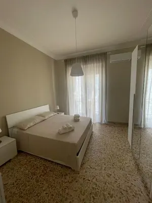 Letto o letti in una camera di Gorizia Home