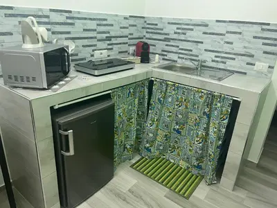 Cucina o angolo cottura di La Maddalena House