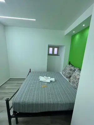 Letto o letti in una camera di La Maddalena House
