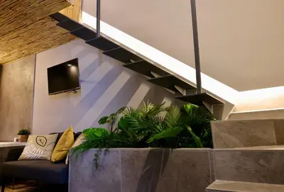 Area soggiorno di Le Nid Luxury Suite