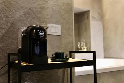 Set per la preparazione di tè e caffè presso Le Nid Luxury Suite