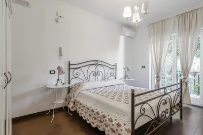 Letto o letti in una camera di GuestHost - Spacious Coastal Flat in Aci Castello
