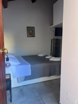 Letto o letti in una camera di CasAurora