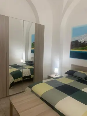 Letto o letti in una camera di Happy House