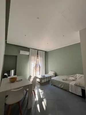 Letto o letti in una camera di La Rosa dello Jonio