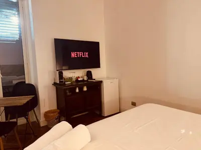 TV o dispositivi per l'intrattenimento presso SWiM Apartment Fronte Mare